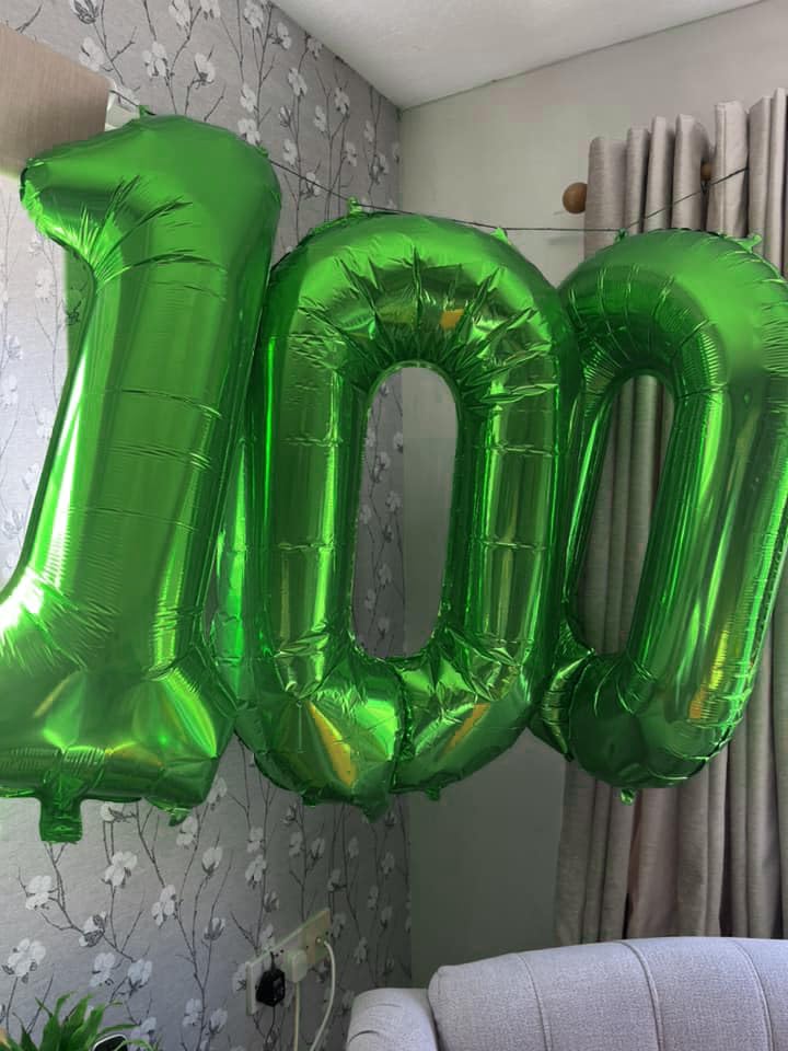 IWERP green balloon backdrop for photo moments and memories.