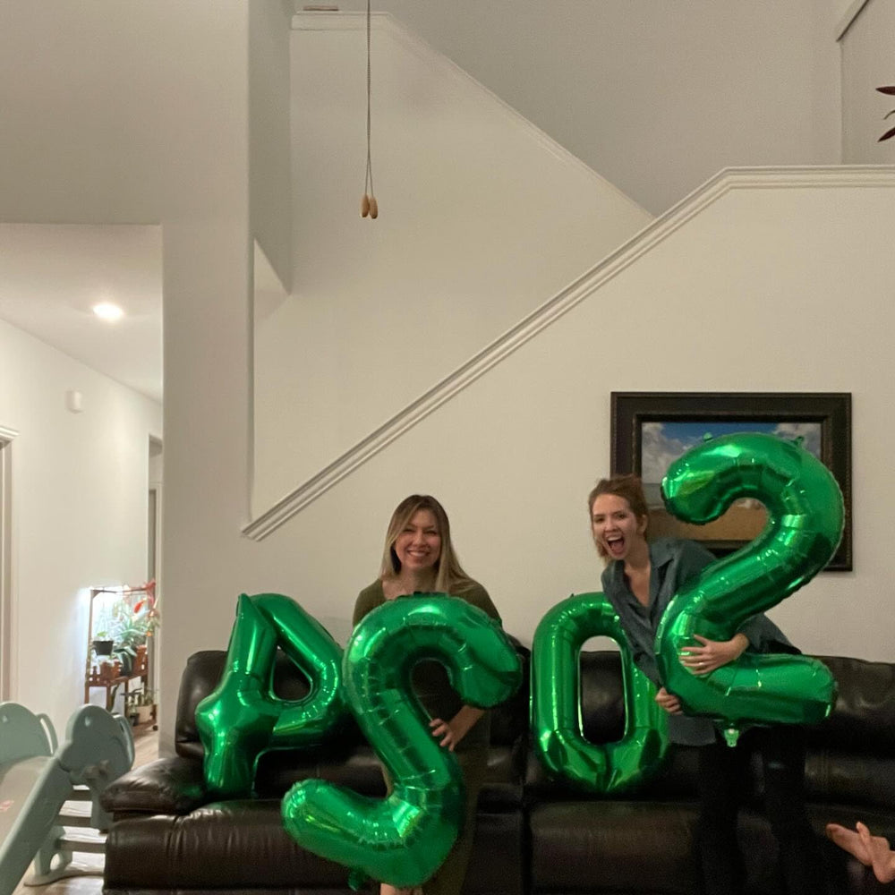 IWERP Green foil Number 4 balloon adds a vibrant focal point.