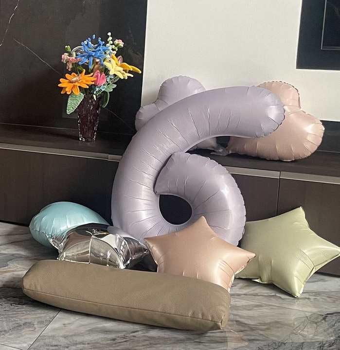 IWERP Milestone birthday decor ideas featuring the lilac number balloon.