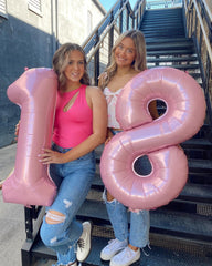 IWERP pearlescent pink number 2 balloon adds upscale sparkle to events.