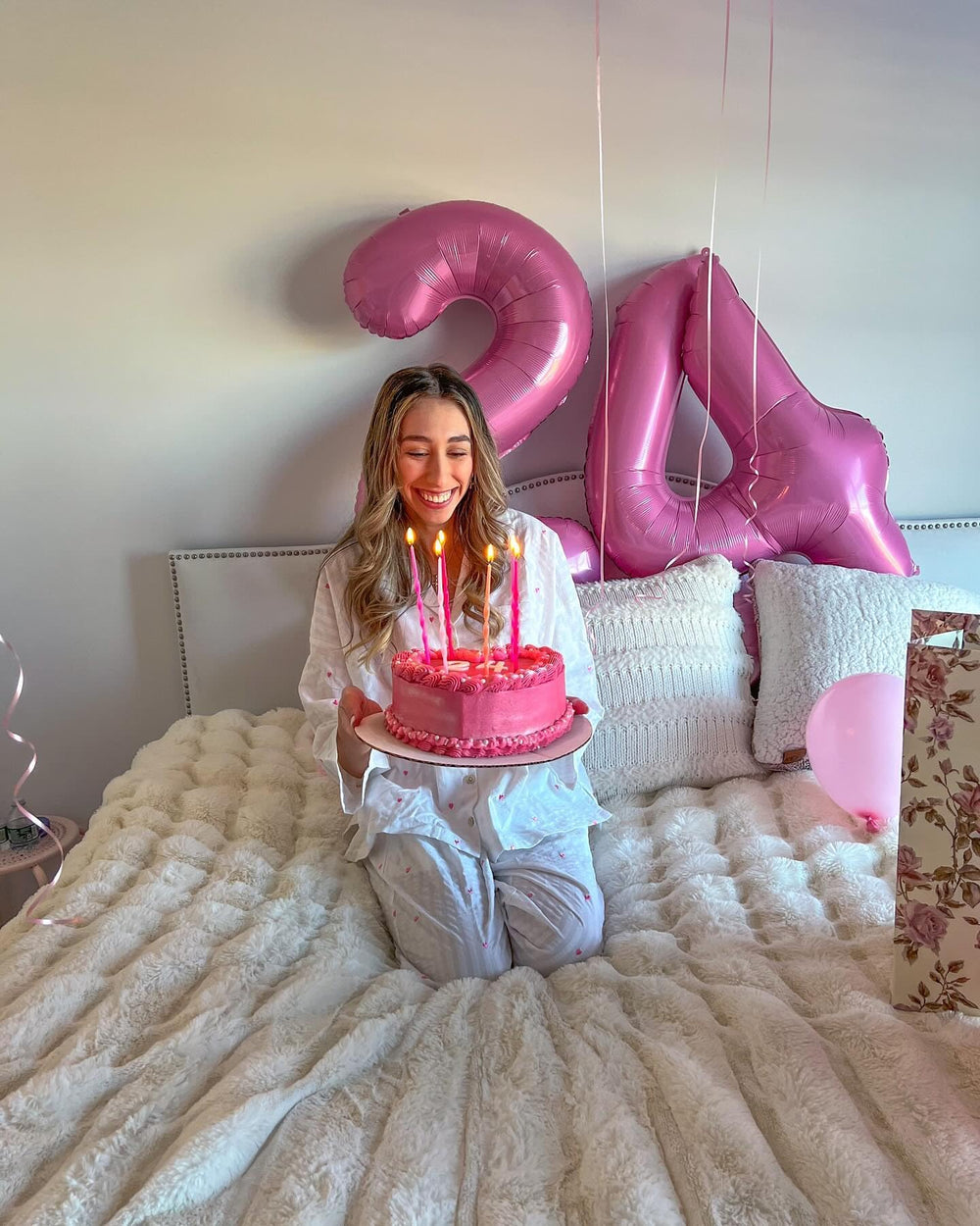 IWERP pink 7 balloon anchors backdrop and photos.