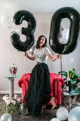 IWERP 9-balloon for milestone birthdays creates a striking backdrop.