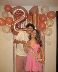 IWERP Rose Gold Number 21 balloon party setup as centerpiece.