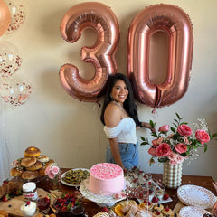 IWERP rose gold number balloon 60 highlights milestone moments.