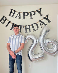 IWERP silver 50 balloon 40-inch display creates a striking centerpiece for parties.