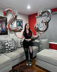 IWERP silver foil balloon offers luminous shimmer for glam party moments.