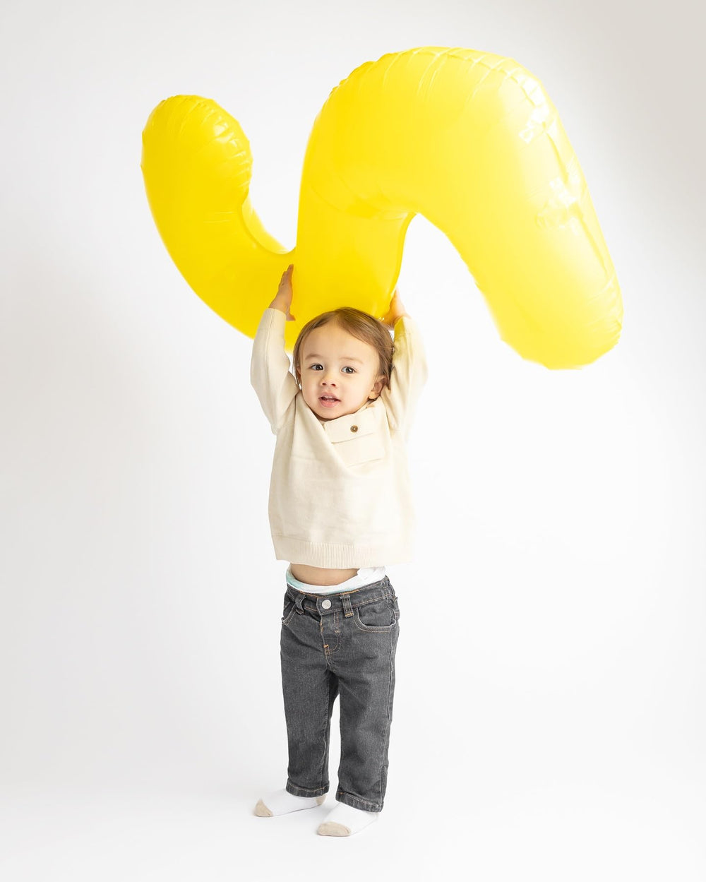 IWERP Yellow 40-inch number balloon used as a birthday centerpiece backdrop.