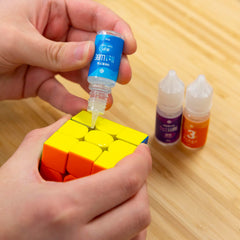 iYallow Speed Cube Lubricant application drop demonstrates precise use for enhanced performance.