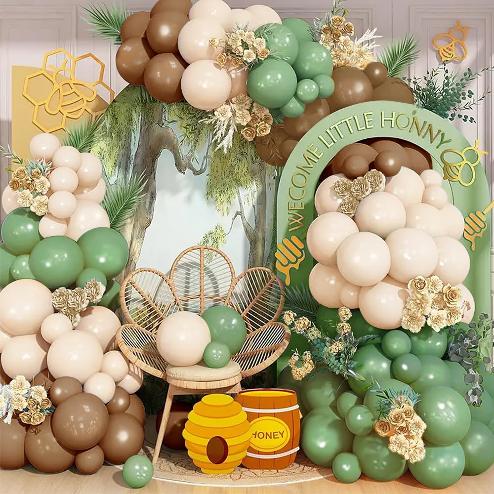 Iyovgoo Sage Green Tan Balloon Arch Kit backdrop enhances gender reveal photos.