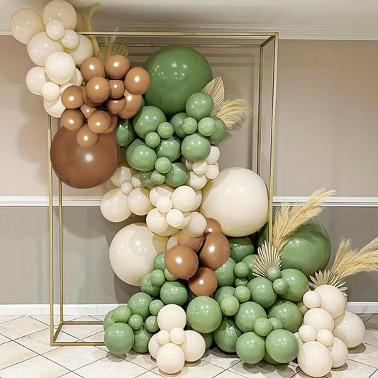 Iyovgoo Sage Green Tan Balloon Arch Kit setup creates a chic baby shower backdrop.