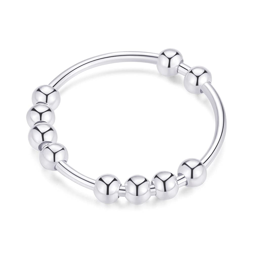 Jacruces 925 silver spinner ring with beads on finger for tactile focus.