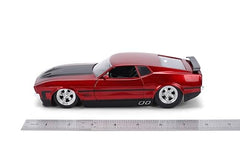 Jada Big Time Muscle Mustang Mach 1 doors open in candy red for interactive viewing.