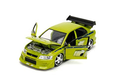 Jada Lime-green Evo VII 1:24-scale model highlighting aero-modifications and wheels.