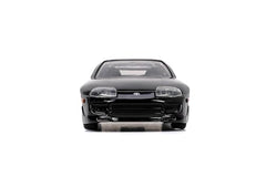 Jada Fast & Furious Toyota Supra die-cast, side view, showpiece for shelf and fans.