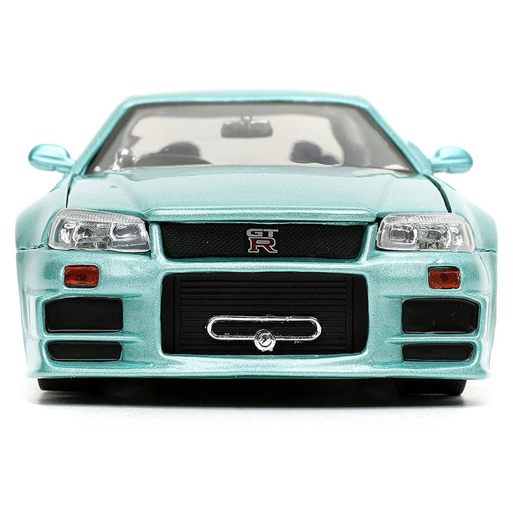 Jada Brian's Skyline GT-R R34 interior detailing enhances realism on display.