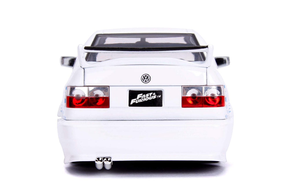 Jada Jesse's Volkswagen Jetta 1:24 open hood reveals engine detail for realism.
