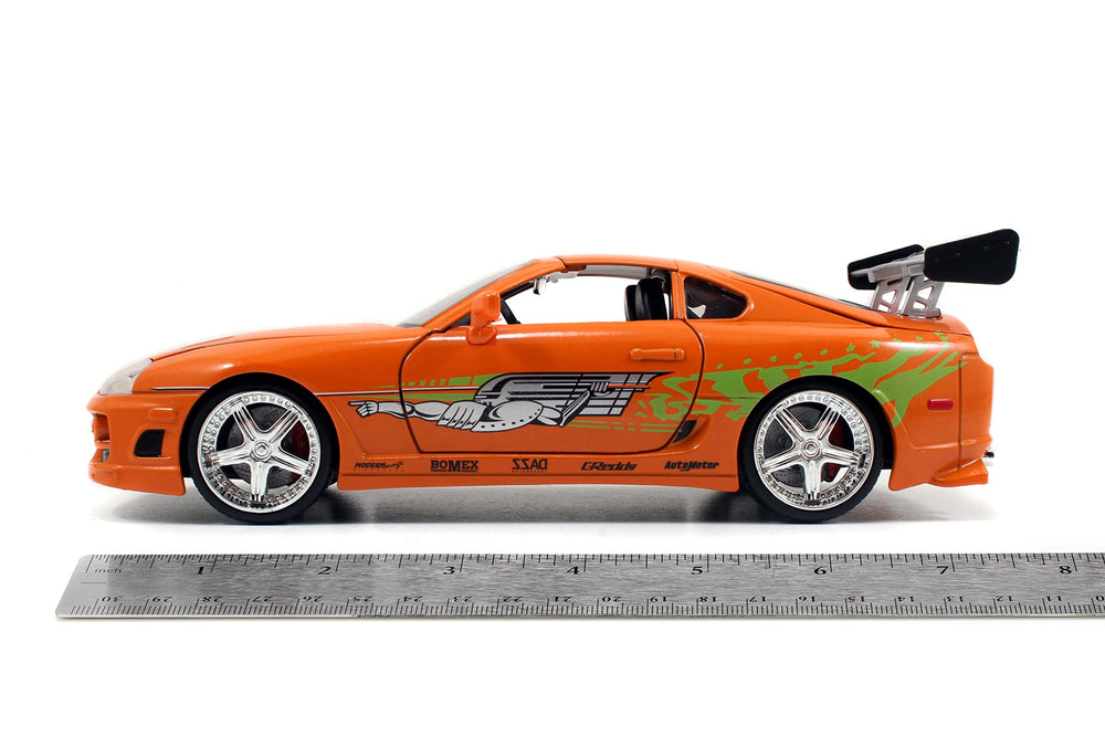 Heavy chrome wheels on Jada Supra 1:24 for durable display