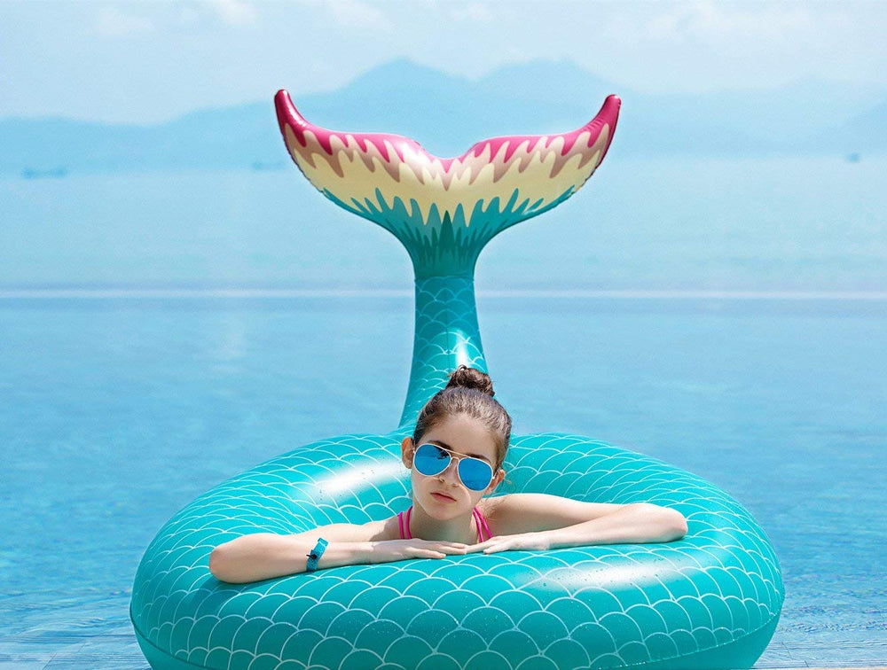 Mermaid tail float with fast valves for quick setup and deflation
