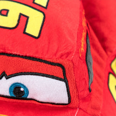 Jay Franco Lightning McQueen pillow buddy in bed showing family-friendly size