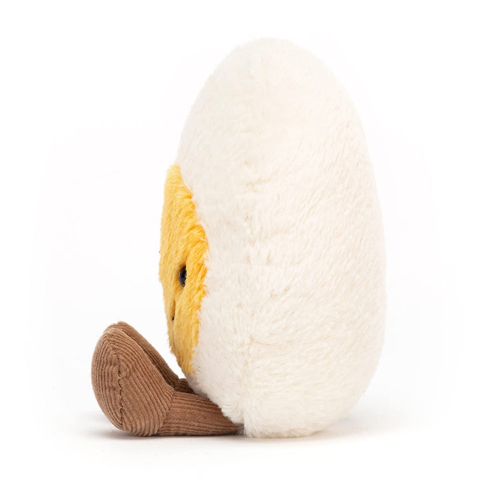 Jellycat Amuseables Boiled Egg Happy plush shows cinnamon cord feet for whimsy.
