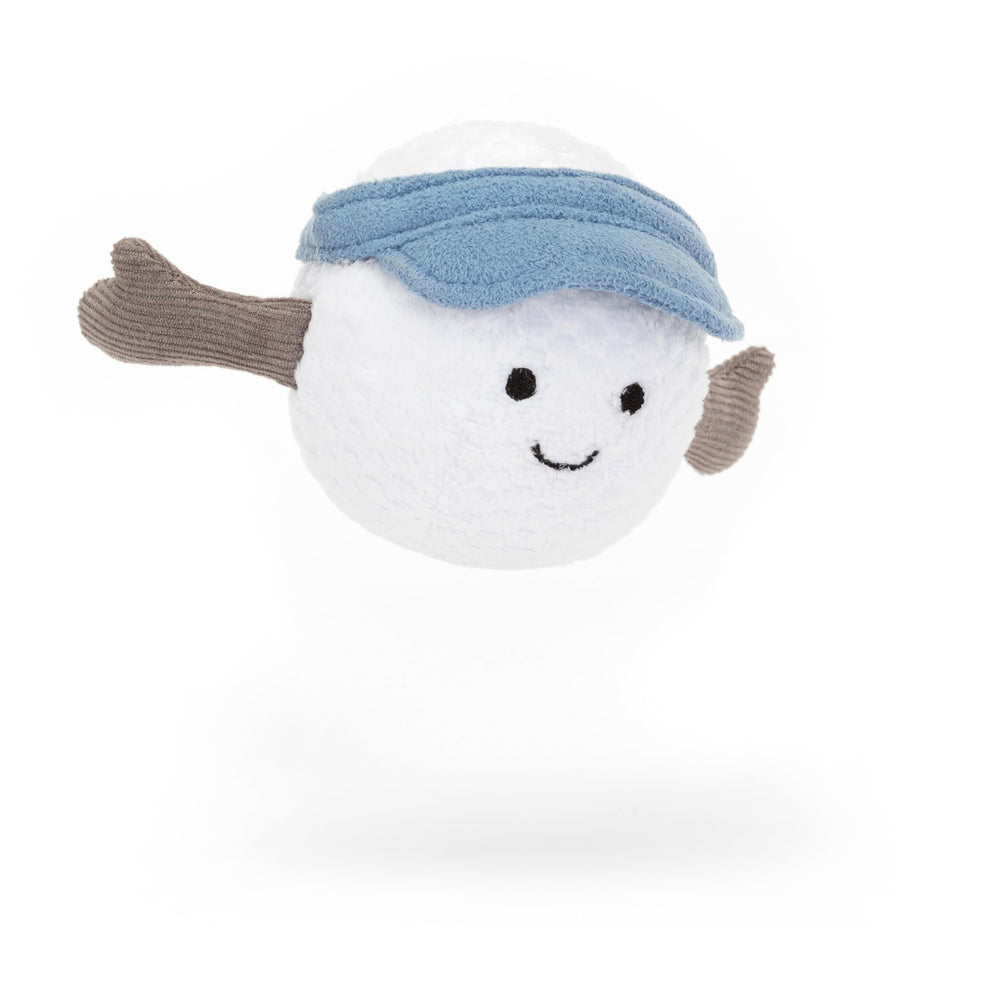 Jellycat Amuseables Golf Ball toy face closeup highlights stitched smile and dimples.