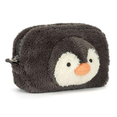 Close-up of the Jellycat Amuseables Pouch showing its compact size for on-the-go storage.