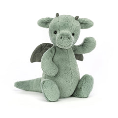 Jellycat Bashful Dragon close-up showing suedette horns and wings for whimsy.