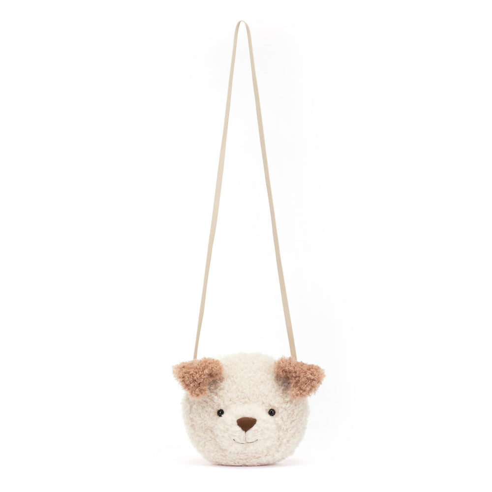 Jellycat Little Pup Bag worn crossbody supports hands-free outings and easy access.
