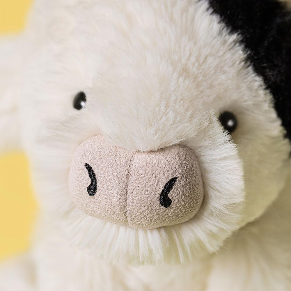 Jellycat Smudge Cow fairway-tour angle adds whimsical décor and child-friendly charm