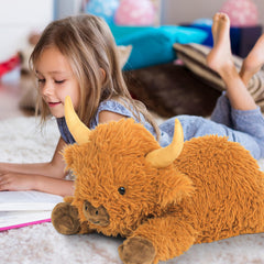 Close-up of weighted beads inside JellyMallow Highland Cow plush for soothing touch.