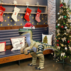 Jet Creations Velociraptor inflatable suitable for kids' play.