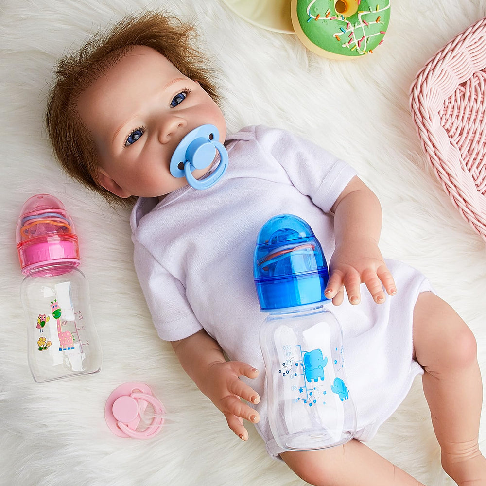 Jexine blue 125 ml doll bottle with pattern for realistic feeding scenarios.