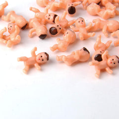 JIAKAI mini babies cake-decoration pieces add charm to desserts.