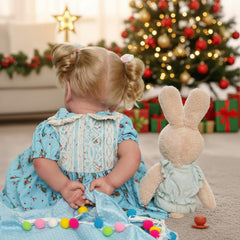 JIZHI cloth-body reborn doll with soft vinyl skin for cuddly feel.