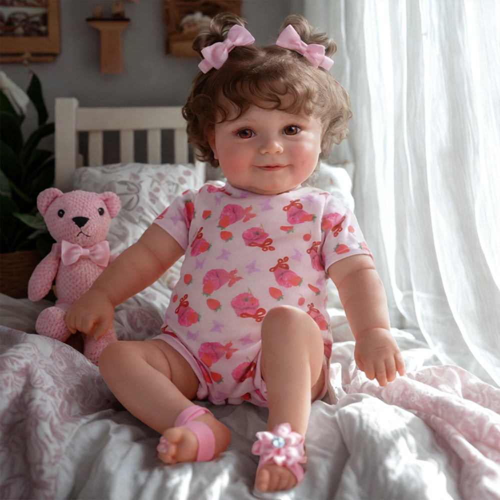 JIZHI smiling reborn doll serves as a friendly display centerpiece and photography prop.