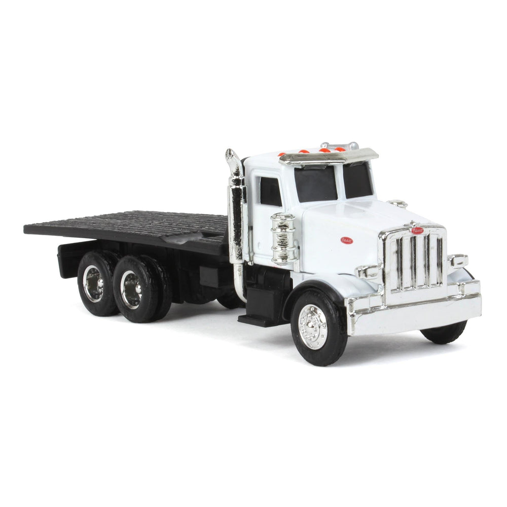 John Deere ERTL Peterbilt flatbed toy truck top view, authentic detailing.