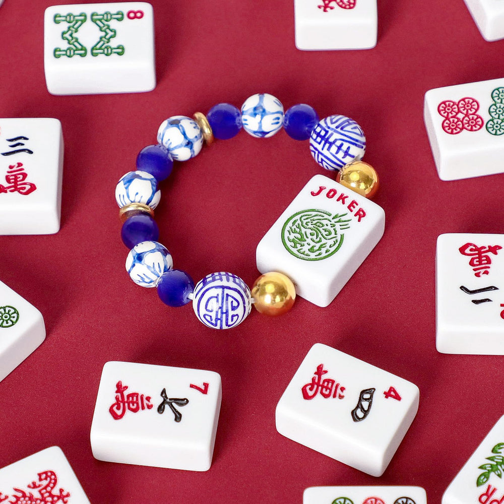 Jongyance lucky Mahjong jewelry adds a touch of fortune.