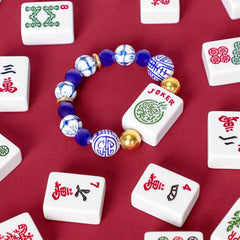 Jongyance lucky Mahjong jewelry adds a touch of fortune.