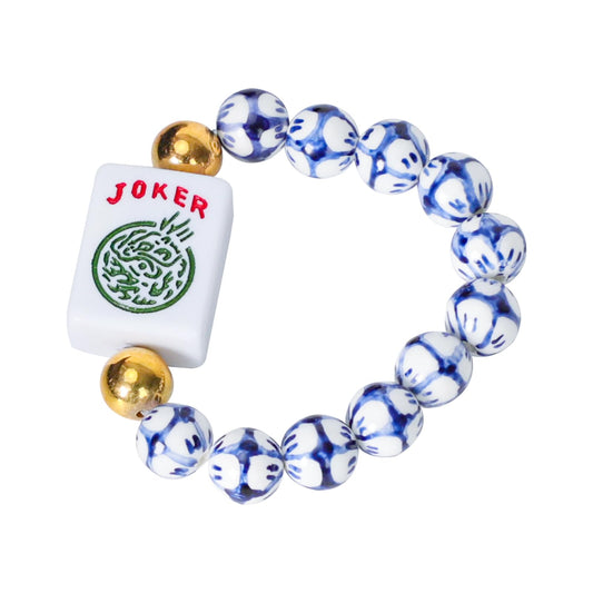 Jongyance Mahjong accessory in blue and white with Joker tile for a stylish gaming vibe.