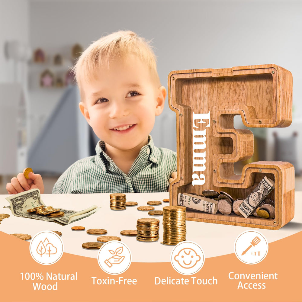 Engraved initial on JOOMLAFLY piggy bank for a personalized gift.