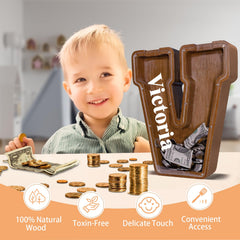 JOOMLAFLY wooden letter piggy bank with transparent panel to track savings