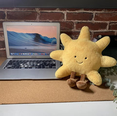 Joson sun-shaped plush toy enhances living room decor with cheer