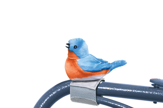 Joy For All Bluebird perched on a walker delivering engaging companionship for seniors.