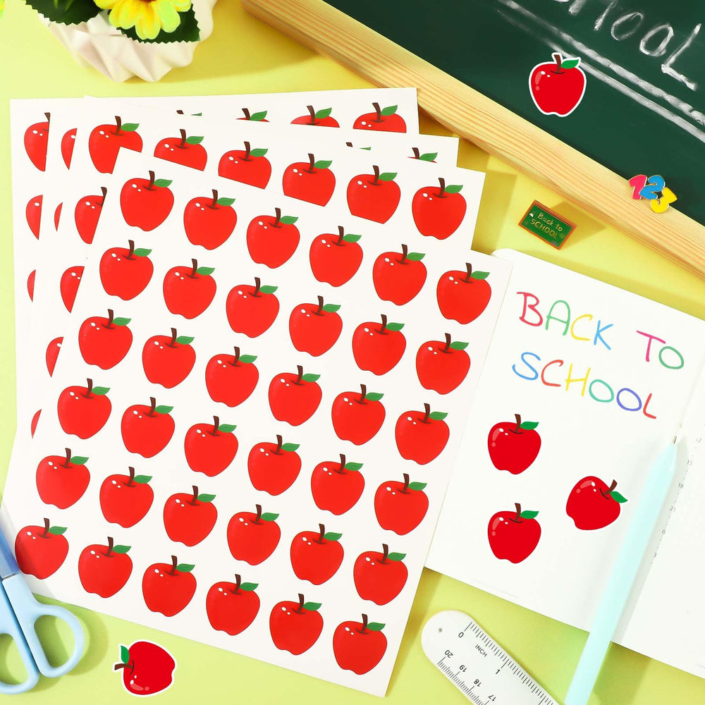 JULMELON laptops and envelopes—apple stickers for quick, fun labeling.