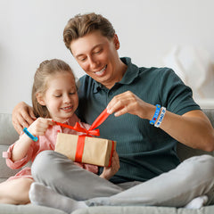 JUNEBRUSHS gift-packaging close-up showing decorative Father's Day designs.