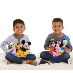 Just Play Pluto plush close-up showing embroidered eyes for child-friendly charm