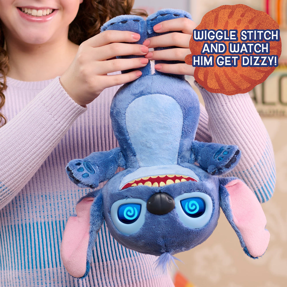 Just Play Stitch upside-down jiggle triggers silly phrases and eye animations.