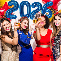 KALOR blue foil balloons create a shiny photo backdrop for celebrations
