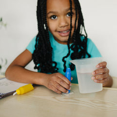 KangaToys Aqua Brush with magic mat in use for repeatable, mess-free doodling.