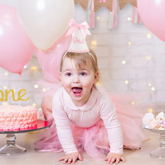 Kaniwati embroidered gold numbers ONE HALF on crown for milestone sparkle.